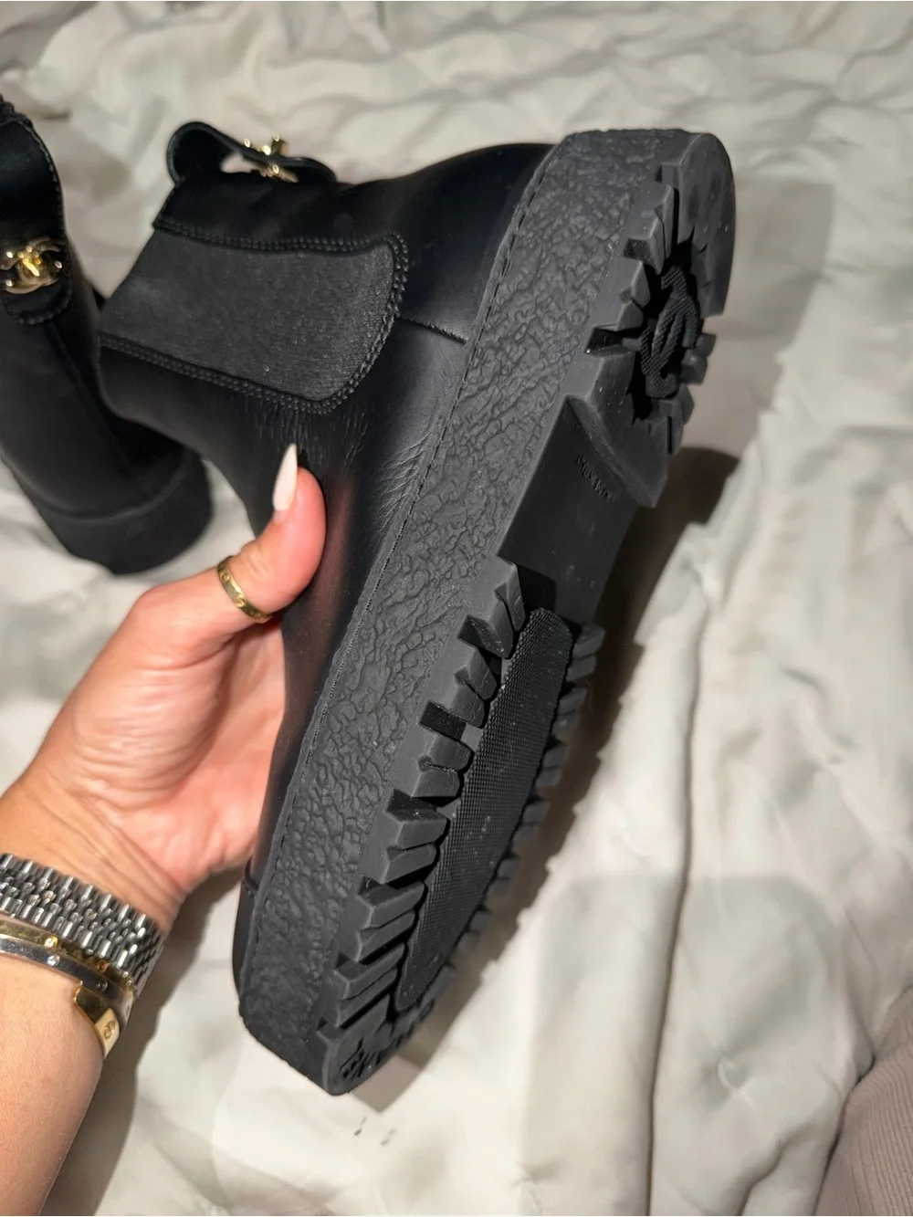 CHANEL Black Leather Platform Chelsea Booties with Gold CC Accent rubber sole